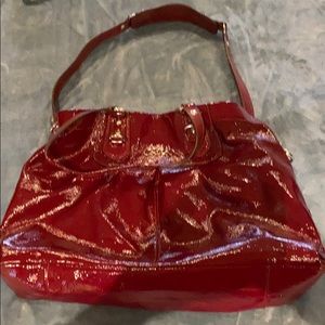 Coach cranberry color purse